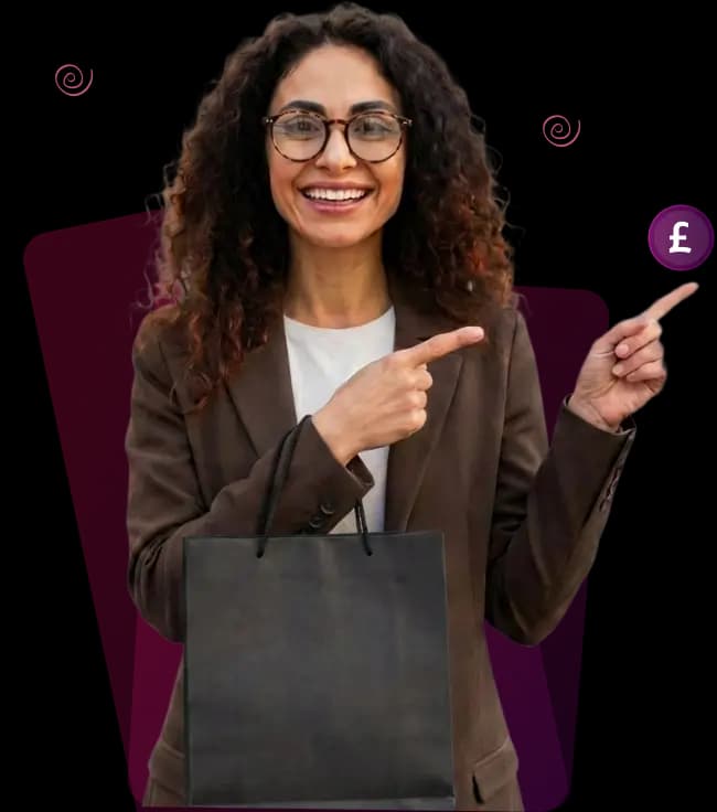 Smiling woman with curly hair and glasses holding a shopping bag while pointing to a pound sterling symbol.