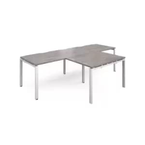 Adapt double straight desks 2800mm x 800mm with 800mm return desks - white frame and grey oak top