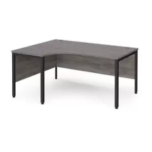 Maestro 25 left hand ergonomic desk 1600mm wide - Black bench leg frame and grey oak top