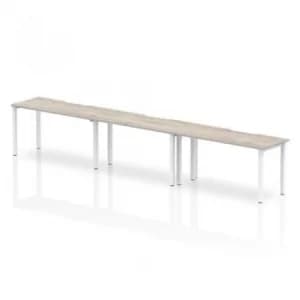 Single White Frame Bench Desk 1400 Grey Oak (3 Pod)