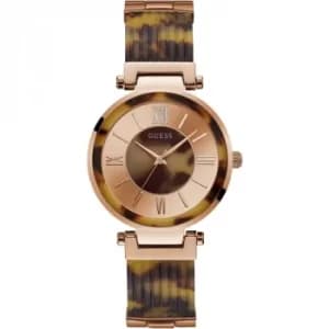 GUESS Ladies rose watch with tortoiseshell trim and bangle bracelet.