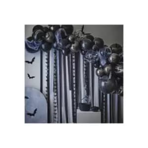 Black and White Balloon Arch with Streamers and Paper Bats