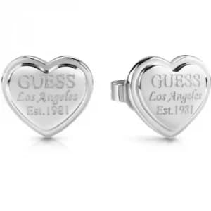 GUESS rhodium plated heart-shaped stud earrings with engraved logo.