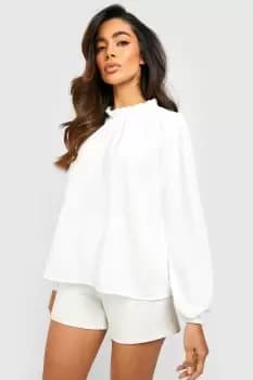 Dobby Ruffle Neck Long Sleeve Blouse