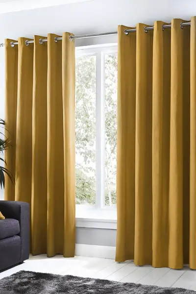 Fusion 'Sorbonne' 100% Cotton Light Filtering Plain Dyed Eyelet Curtains Mustard