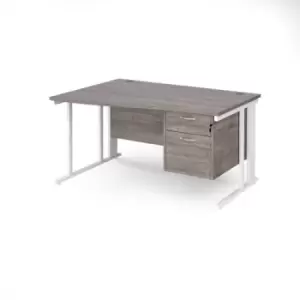 Maestro 25 left hand wave desk 1400mm wide with 2 drawer pedestal - white cable managed leg frame and grey oak top