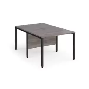 Maestro 25 back to back straight desks 1000mm x 1600mm - Black bench leg frame and grey oak top