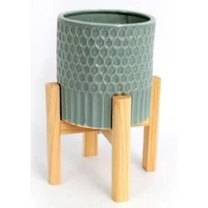 Large Ceramic Teal Coloured Planter On Wooden Stand