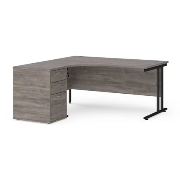 Maestro 25 left hand ergonomic desk 1600mm with Black cantilever frame and desk high pedestal - grey oak