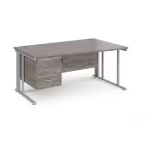 Maestro 25 right hand wave desk 1600mm wide with 3 drawer pedestal - silver cable managed leg frame and grey oak top