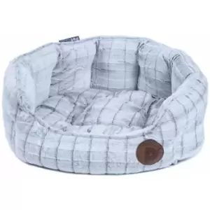 White plush oval dog bed small