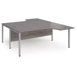 Maestro 25 back to back ergonomic desks 1800mm deep - silver bench leg frame and grey oak top