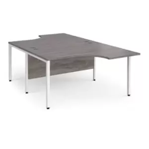 Maestro 25 back to back ergonomic desks 1400mm deep - white bench leg frame and grey oak top