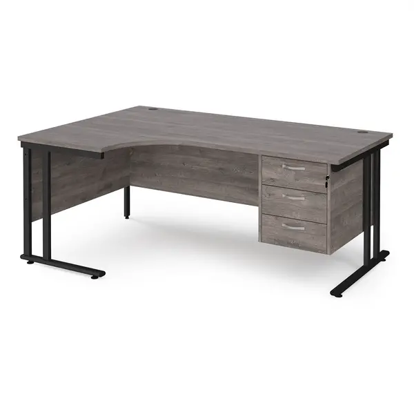 Maestro 25 left hand ergonomic desk 1800mm wide with 3 drawer pedestal - Black cantilever leg frame, grey oak top