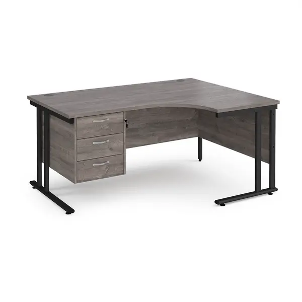 Maestro 25 right hand ergonomic desk 1600mm wide with 3 drawer pedestal - Black cantilever leg frame, grey oak top