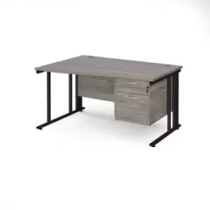 Maestro 25 left hand wave desk 1400mm wide with 2 drawer pedestal - Black cable managed leg frame and grey oak top