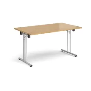 Rectangular folding leg table with silver legs and straight foot rails 1400mm x 800mm - oak