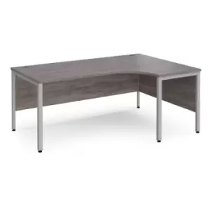 Maestro 25 right hand ergonomic desk 1800mm wide - silver bench leg frame and grey oak top