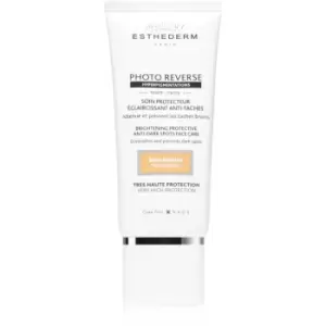 Institut Esthederm Photo Reverse Brightening Protective Anti-Dark Spots Face Care Anti-Dark Spots Protective Cream High Sun Protection Shade Medium Be