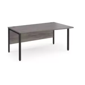 Maestro 25 right hand wave desk 1600mm wide - Black bench leg frame and grey oak top