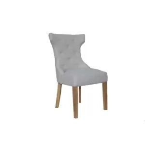 Kettle Interiors Winged Button Back Chair With Metal Ring Natural