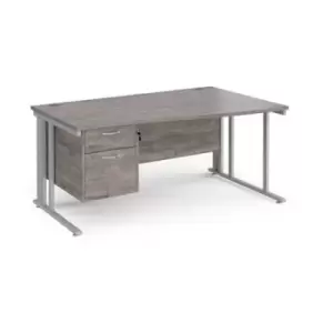 Maestro 25 right hand wave desk 1600mm wide with 2 drawer pedestal - silver cable managed leg frame and grey oak top