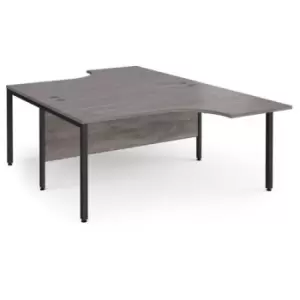 Maestro 25 back to back ergonomic desks 1600mm deep - Black bench leg frame and grey oak top