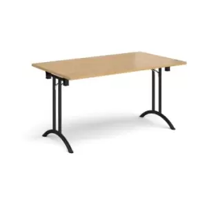 Rectangular folding leg table with Black legs and curved foot rails 1400mm x 800mm - oak