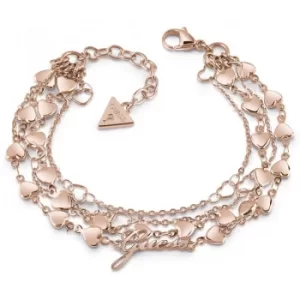 GUESS rose gold plated four-row multi heart chain bracelet.