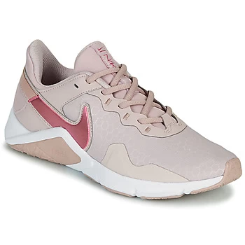 Nike LEGEND ESSENTIAL 2 womens Sports Trainers (Shoes) in Beige