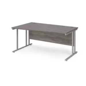 Maestro 25 left hand wave desk 1600mm wide - silver cantilever leg frame and grey oak top