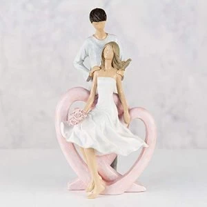 Resin Figurine - Man Holding Lady with Flowers