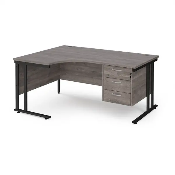 Maestro 25 left hand ergonomic desk 1600mm wide with 3 drawer pedestal - Black cantilever leg frame, grey oak top