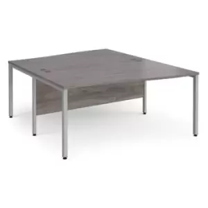 Maestro 25 back to back wave desks 1600mm deep - silver bench leg frame and grey oak top