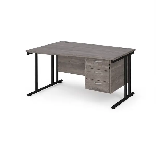 Maestro 25 left hand wave desk 1400mm wide with 3 drawer pedestal - Black cantilever leg frame, grey oak top