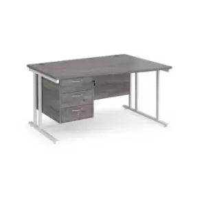 Maestro 25 right hand wave desk 1400mm wide with 3 drawer pedestal - white cantilever leg frame and grey oak top