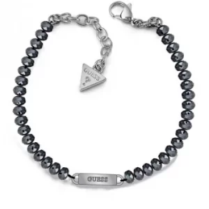 GUESS midnight blue bead bracelet with rhodium plated logo plaque.